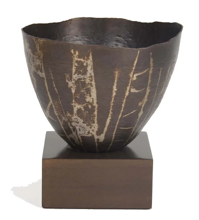 A Patinated Dinanderie Vase from the Cleveland Institute.