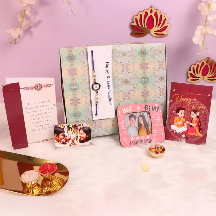 Rakshabandhan Gift Hamper for Brother and Bhabhi, Megantice and acrylic photo frame, Evil Eye Rakhi with Chawal and Roli Gift Set for Celebrate Raksha Bandhan