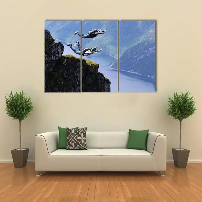 Wingsuit Flying Over Norwegian Landscape Canvas Wall Art